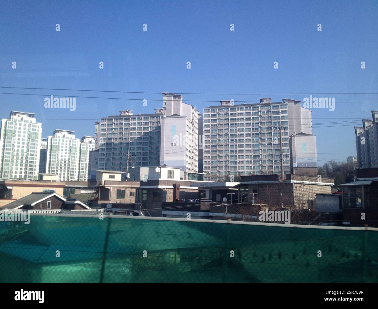 View of Apartment complex in South Korea. Numerous high-rise buildings with ...