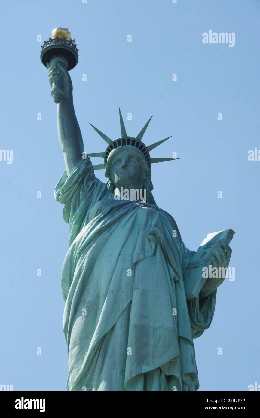 A close-up of New York's Statue of Liberty crown reveals sunbeams ...