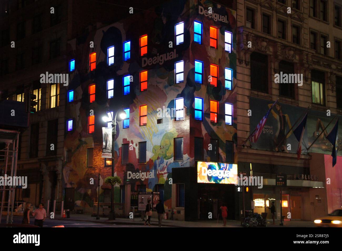A colorful mural adorns the Desigual clothing store facade in New York ...