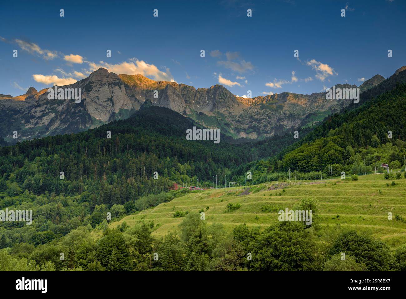 Sunset over the mountains at the northern entrance to the tunnel and ...