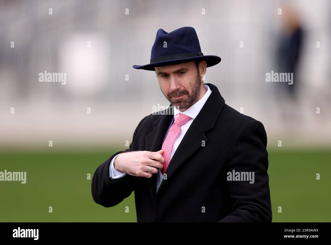 A racegoer attends the Betfair Ascot Chase Raceday at Ascot Racecourse ...