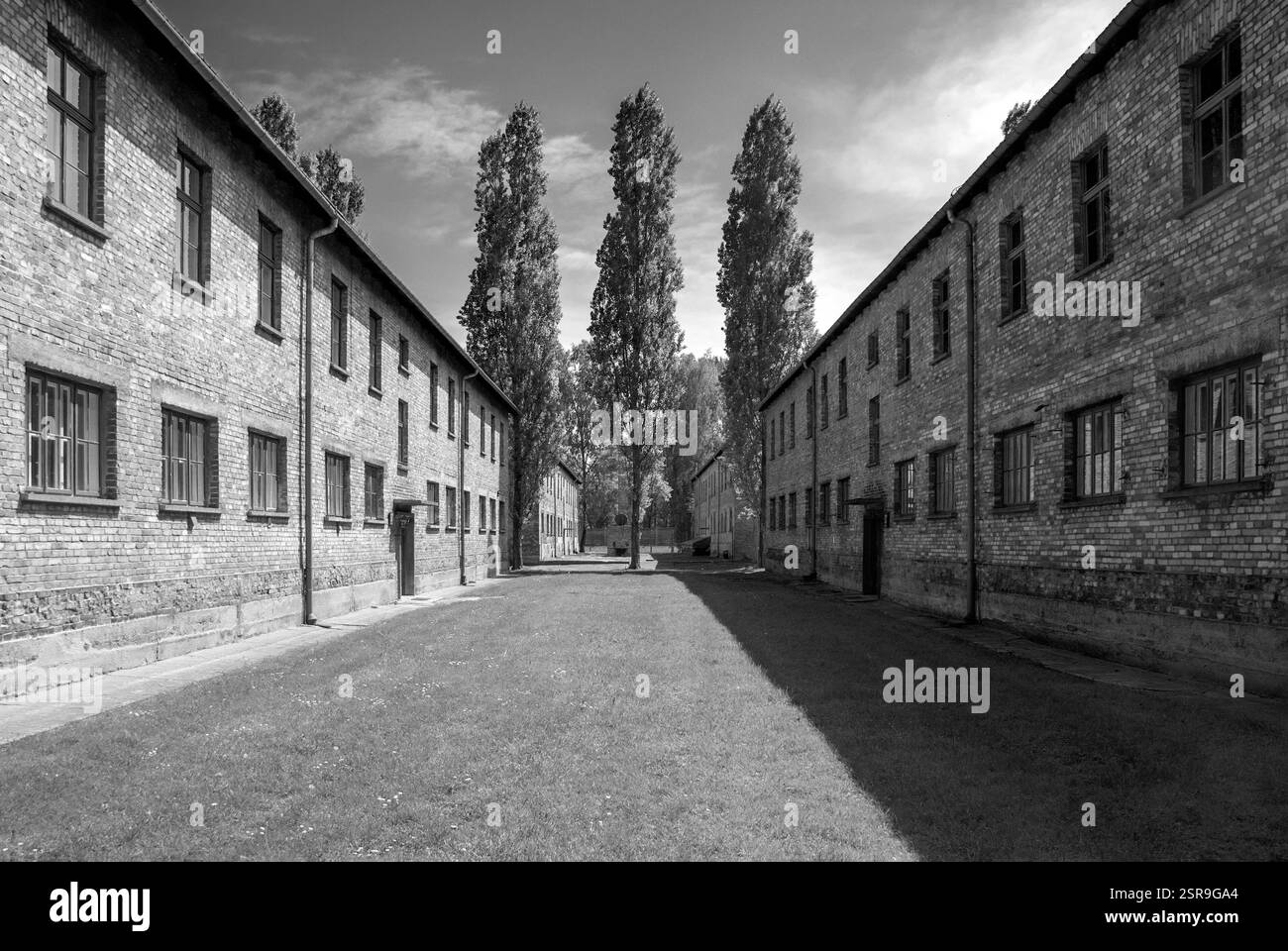 Monochrome of camp buildings at Memorial and Museum Auschwitz-Birkenau Stock Photo