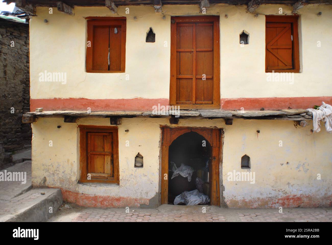 Front view of local house at Mana village on Indo-Tibetan border, Uttaranchal Uttarakhand, India, Asia Stock Photo