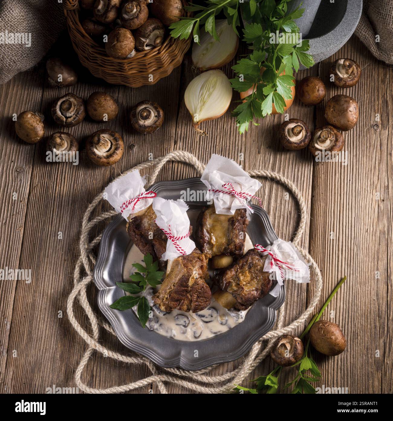 Grilled rinderrippchen with mushroom sauce Stock Photo - Alamy