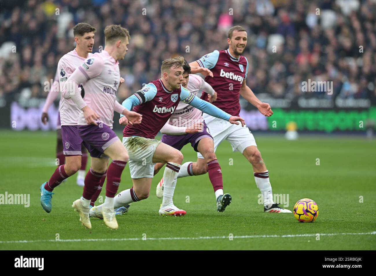 London, UK. 15th Feb, 2025. No way through the Brentford defence for Jarrod Bowen of West Ham Utd during the West Ham vs Brentford, Premier League match at the London Stadium Stratford. This Image is for EDITORIAL USE ONLY. Licence required from the Football DataCo for any other use. Credit: MARTIN DALTON/Alamy Live News Stock Photo