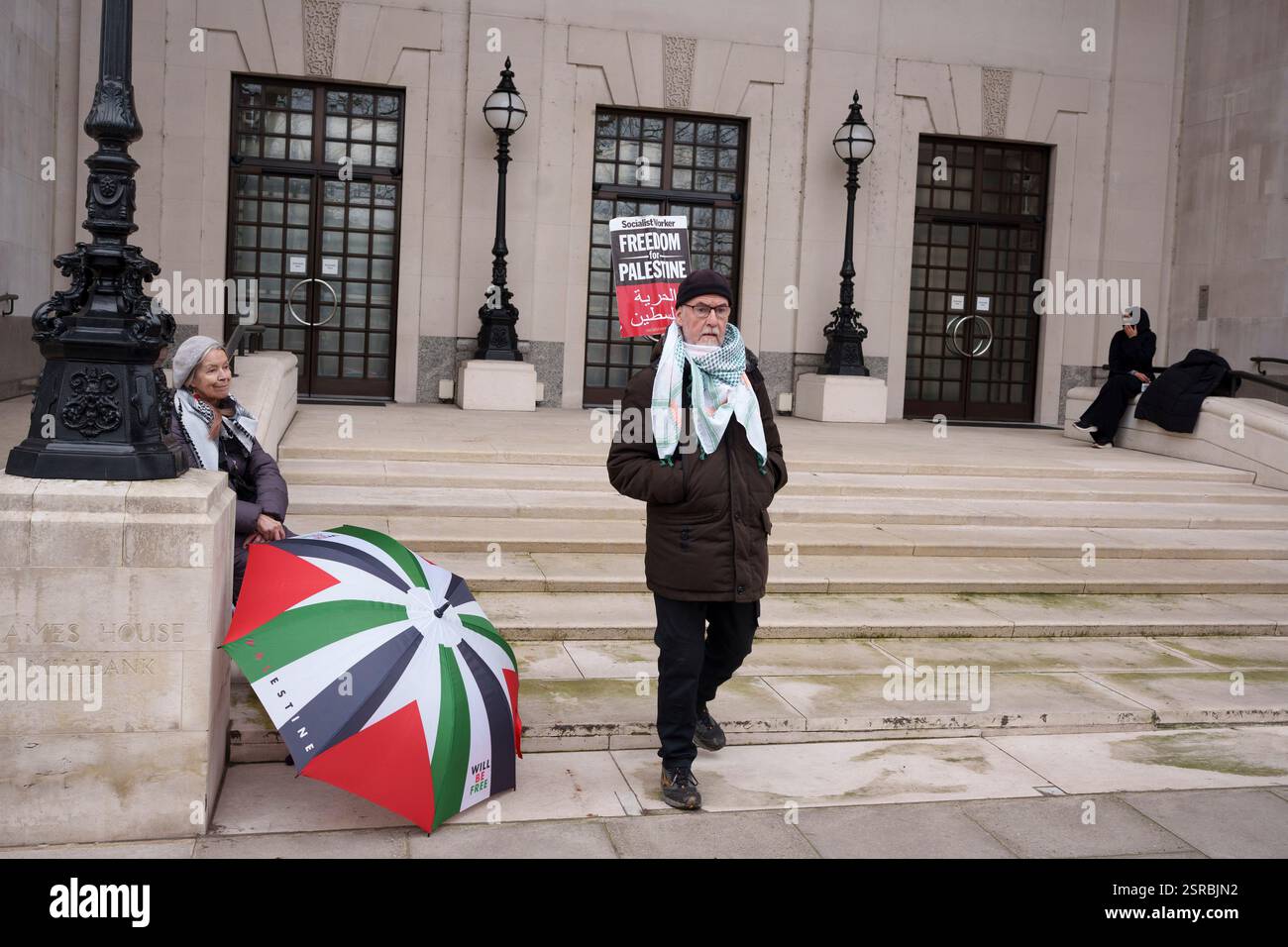 Protesters from the Palestine Coalition and the Palestine Solidarity Campaign and the main entrance to Thames House, the headquarters of MI5 during the march from Whitehall to the US embassy in Nine Elms, on 15th February 2025, in London, England. In response to US President Trump’s intention of the United States to clear Gaza of 2 million Palestinian people, protesters sent a message to the British government and to Trump for freedom for Palestine, for no ethnic cleansing and to stop arming Israel. Stock Photo