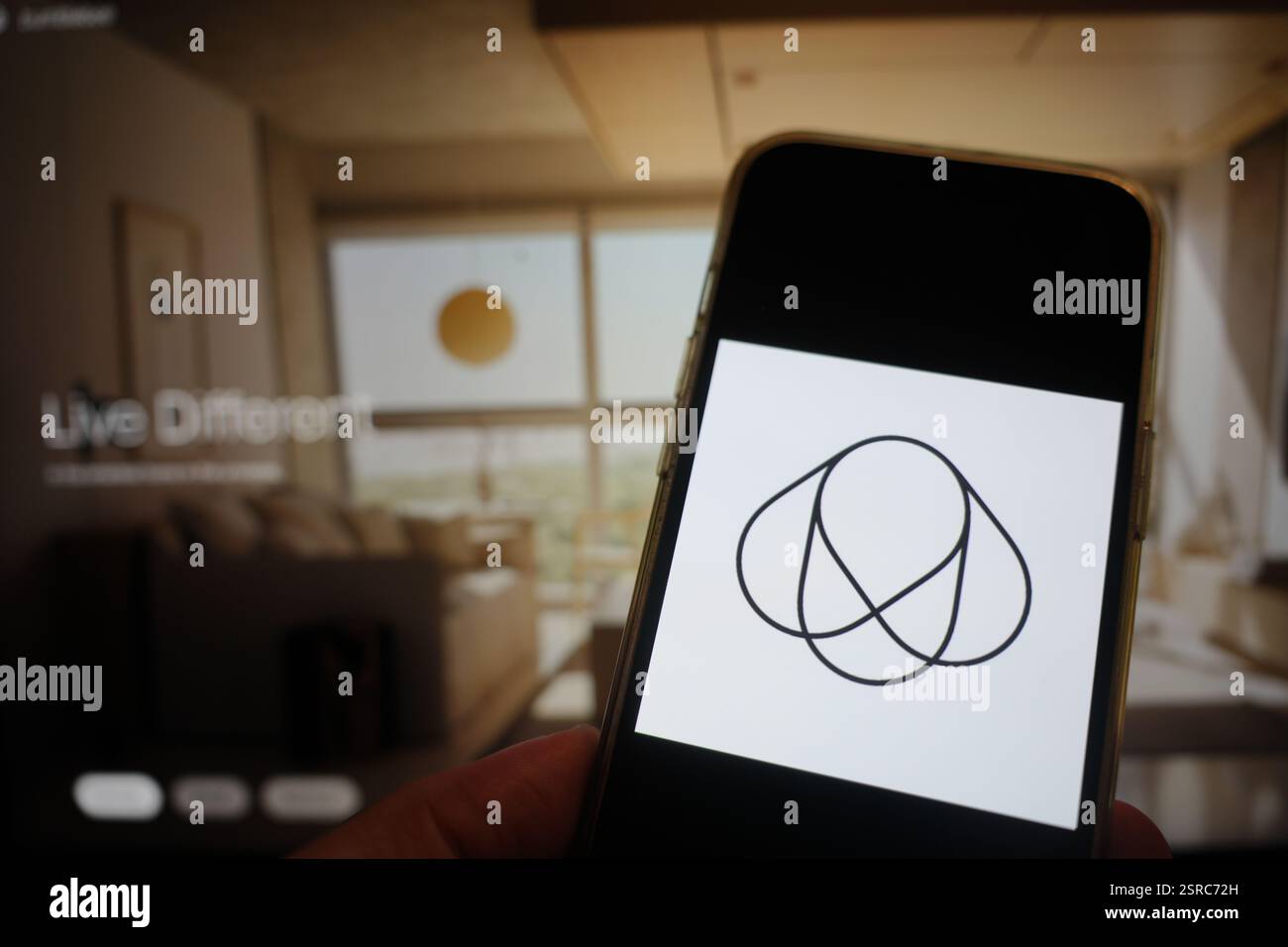 Roosendaal, The Netherlands - February 15, 2025: A mobile phone displaying the logo of Bumblebee Spaces, with the company website in the background. Stock Photo