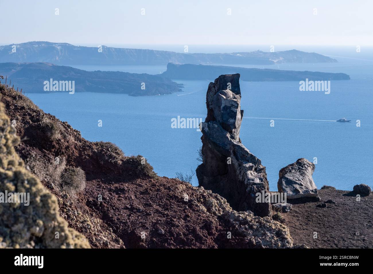 Volcanic rocks and Kameni volcano in Santorini, at the beginning of ...
