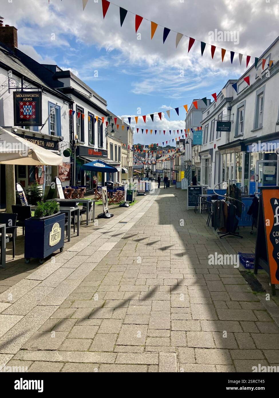 Molesworth Street, Wadebridge, Cornwall with Shoppers and Bunting in Summer - Smartphone Captured Stock Image