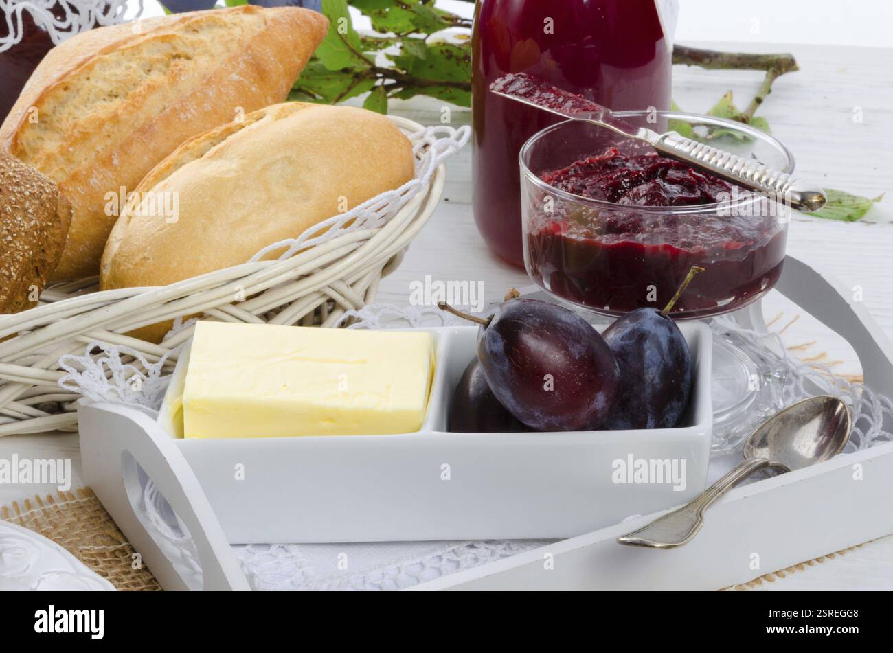 Breakfast with plum jam Stock Photo - Alamy