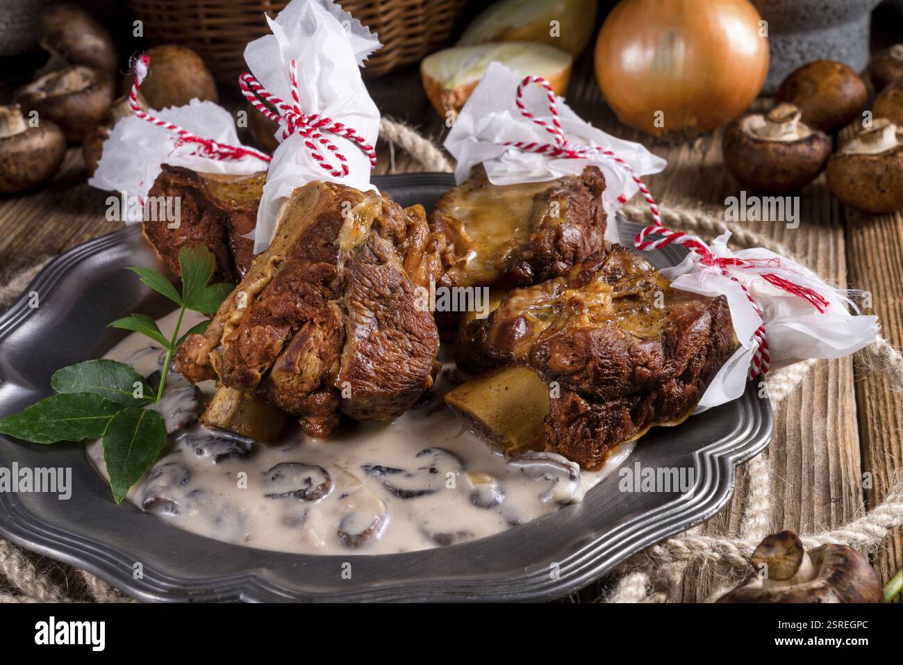 Grilled rinderrippchen with mushroom sauce Stock Photo - Alamy