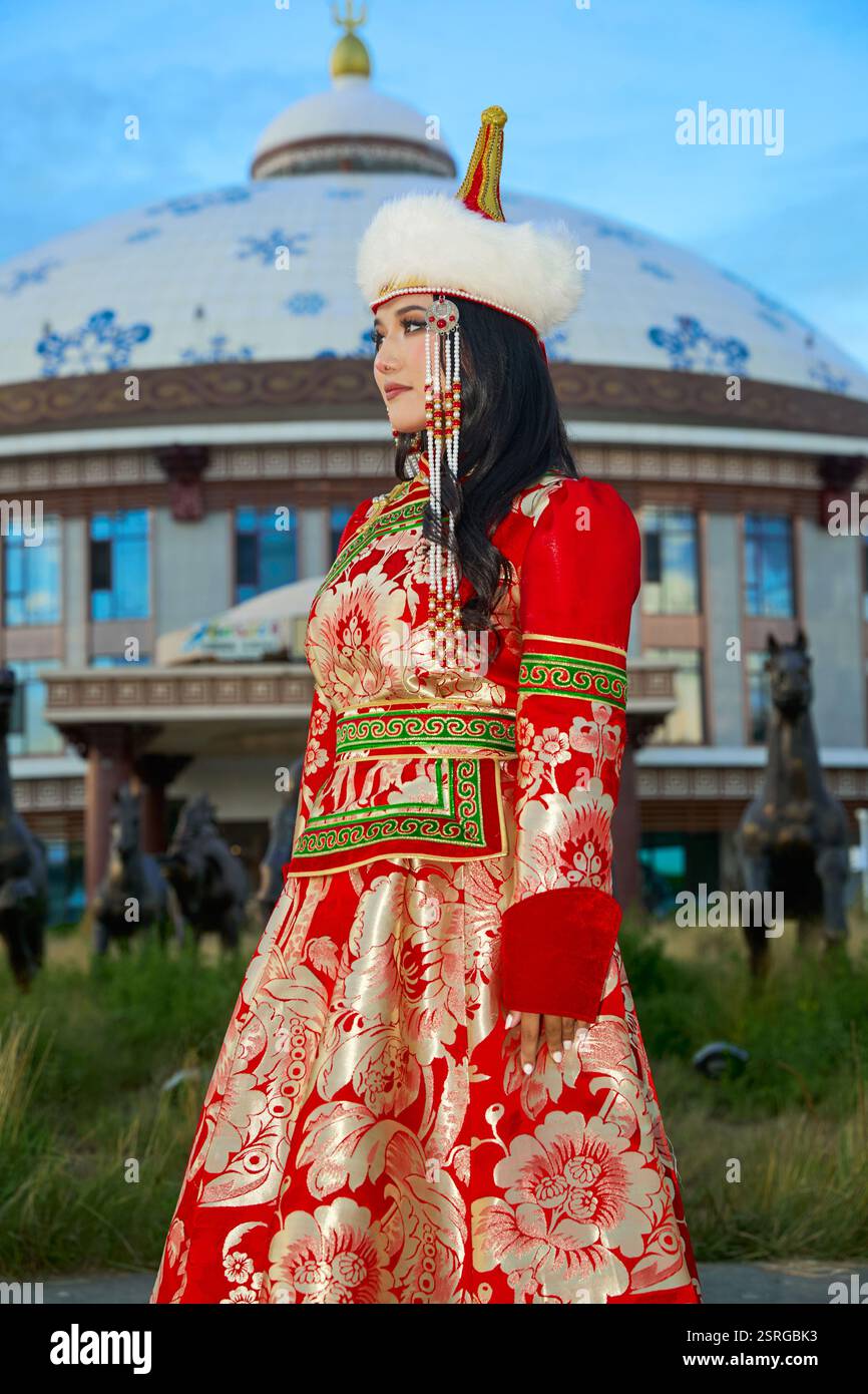 Mongolian girl wearing traditional costume of the Mongolian Ordos tribe ...