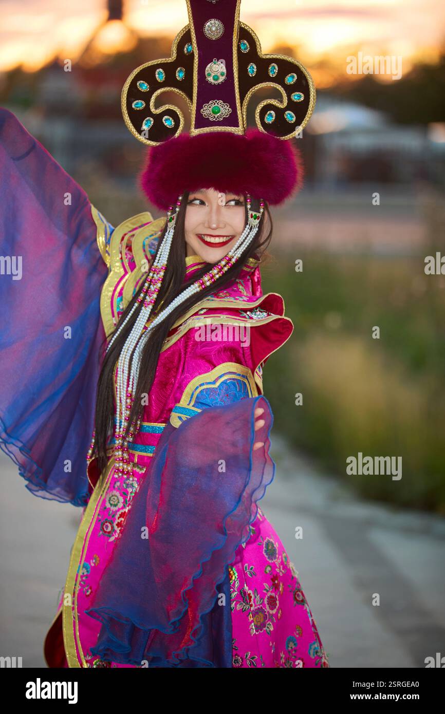 Mongolian girl wearing traditional costume of the Mongolian Stock Photo ...