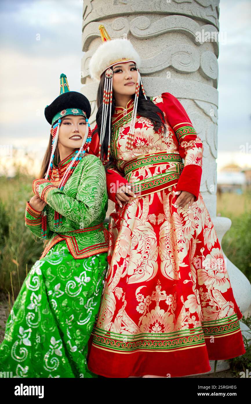 Mongolian girl wearing traditional costume of the Mongolian Ordos tribe ...