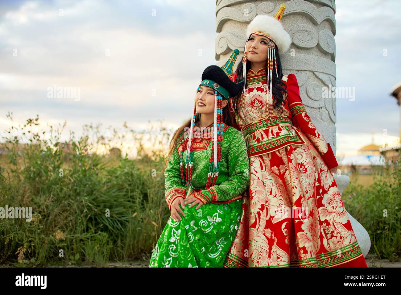 Mongolian girl wearing traditional costume of the Mongolian Ordos tribe ...