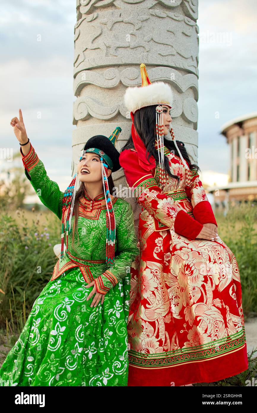 Mongolian girl wearing traditional costume of the Mongolian Ordos tribe ...