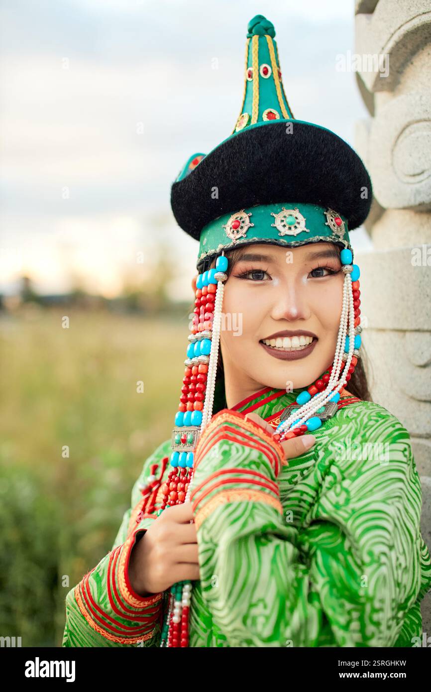 Mongolian girl wearing traditional costume of the Mongolian Ordos tribe ...