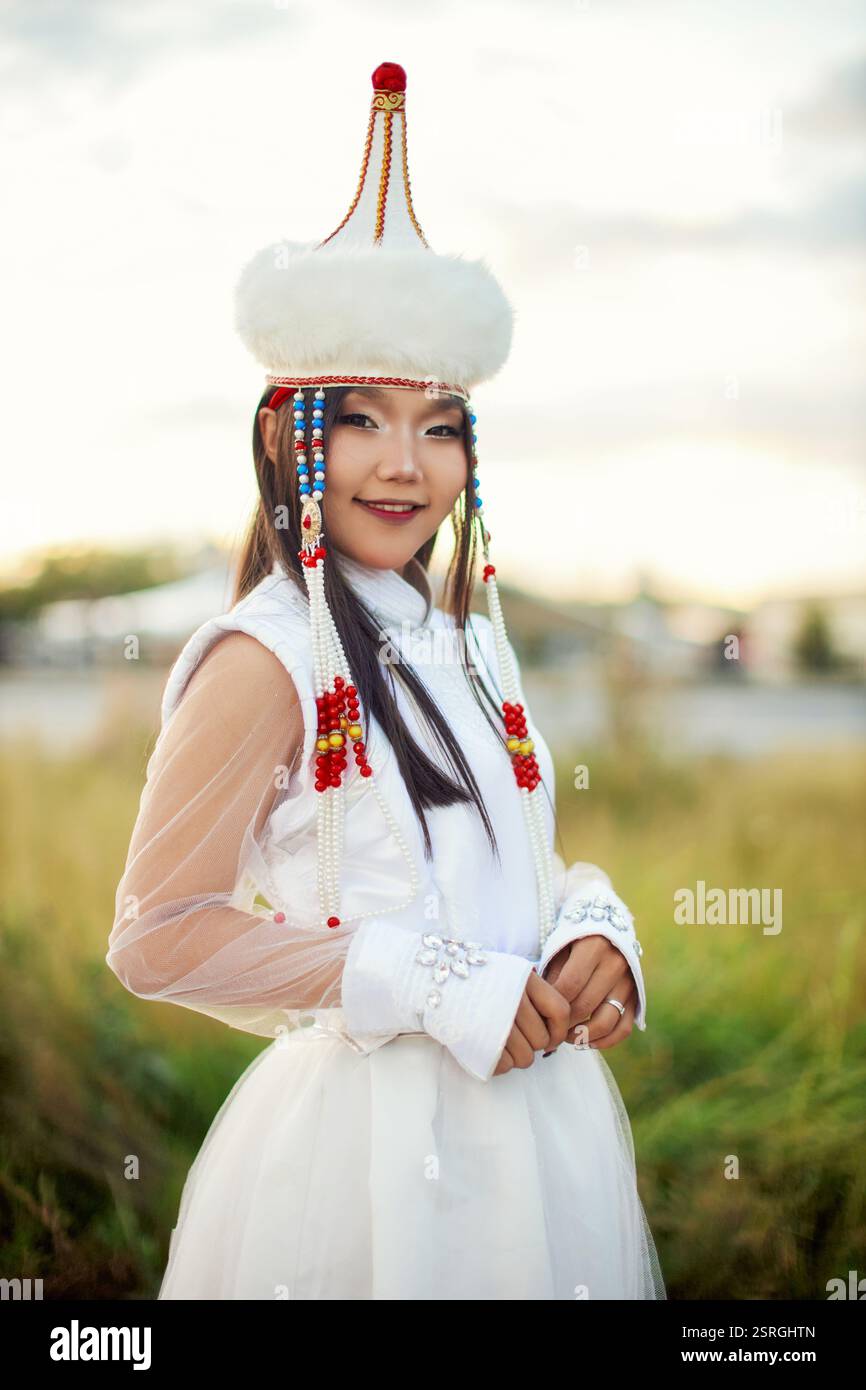 Mongolian girl wearing traditional costume of the Mongolian Ordos tribe ...