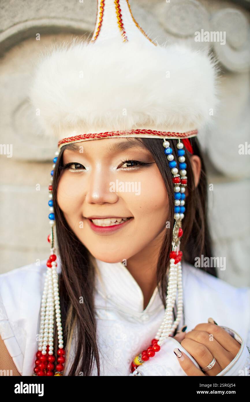 Mongolian girl wearing traditional costume of the Mongolian Ordos tribe ...
