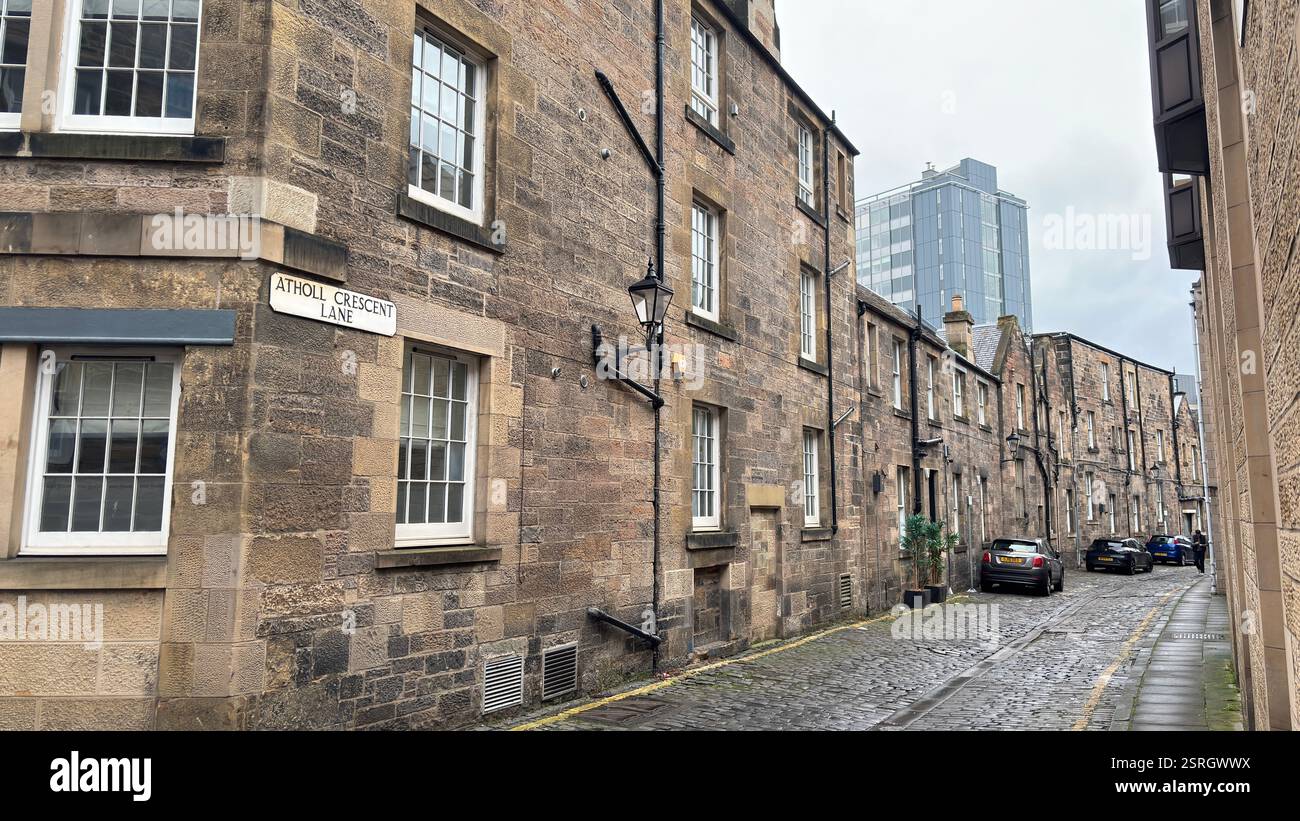 Old Victorian terrace buildings in Canning Street Lane, Edinburgh. Scottish stone classic houses. Cobbled street. Iconic Scottish street view - Smartphone Captured Stock Image