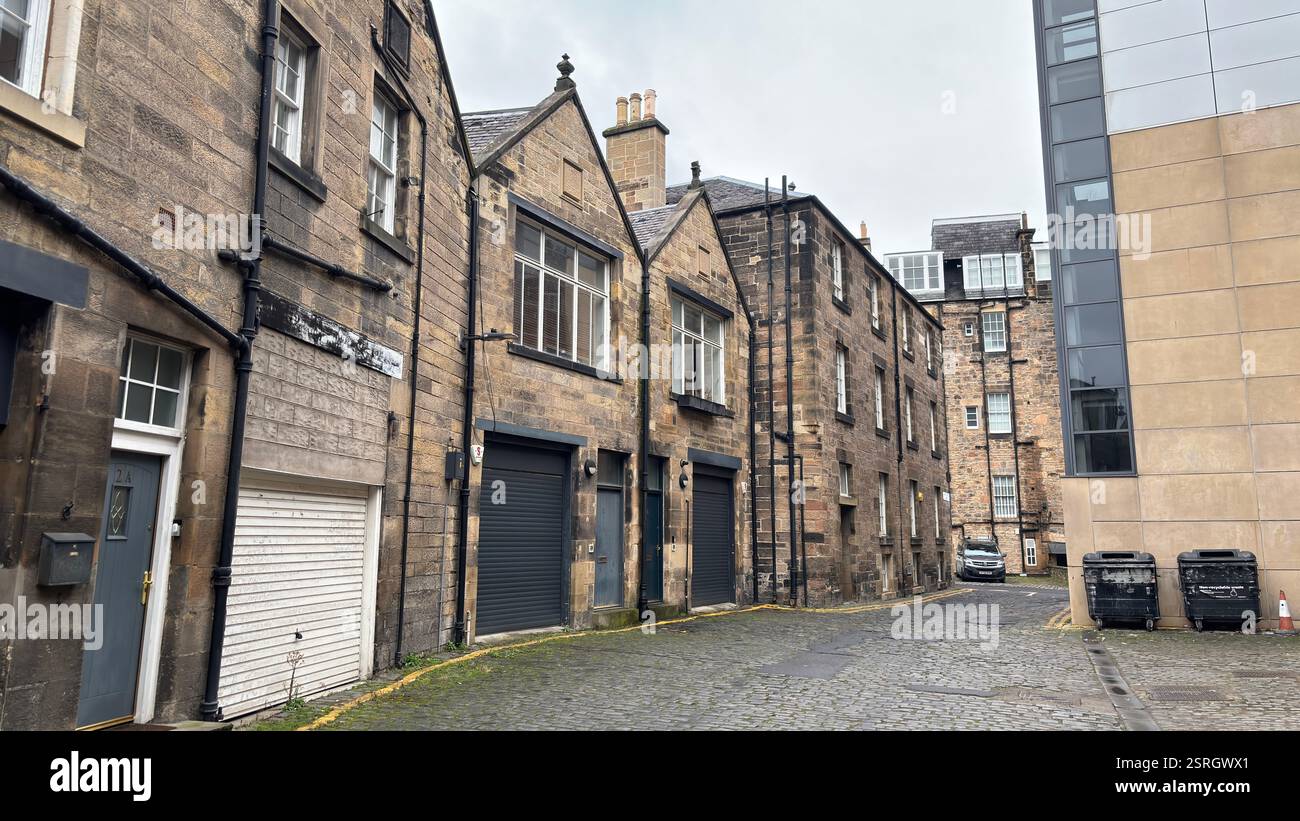 Old Victorian terrace buildings in Canning Street Lane, Edinburgh. Scottish stone classic houses. Cobbled street. Iconic Scottish street view - Smartphone Captured Stock Image