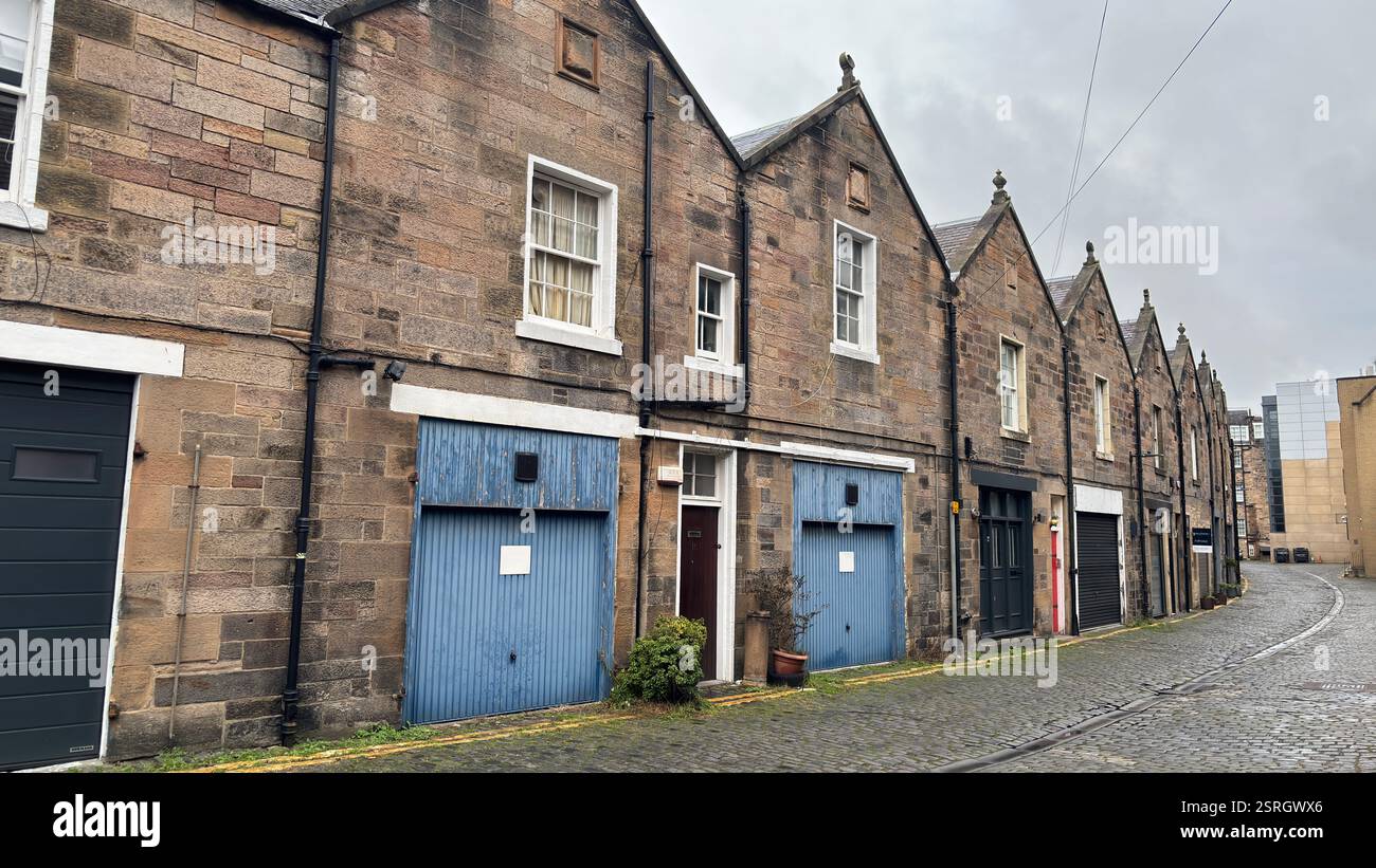 Old Victorian terrace buildings in Canning Street Lane, Edinburgh. Scottish stone classic houses. Cobbled street. Iconic Scottish street view - Smartphone Captured Stock Image