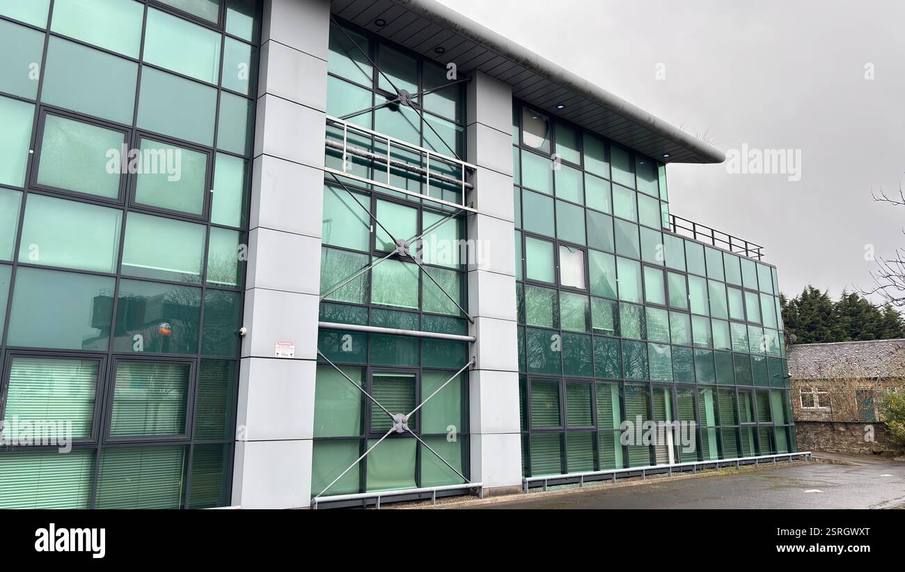 Modern brutal architecture flat living in the middle of the city of Edinburgh. Grungy urban architecture. Modern brutal concrete structure - Smartphone Captured Stock Image