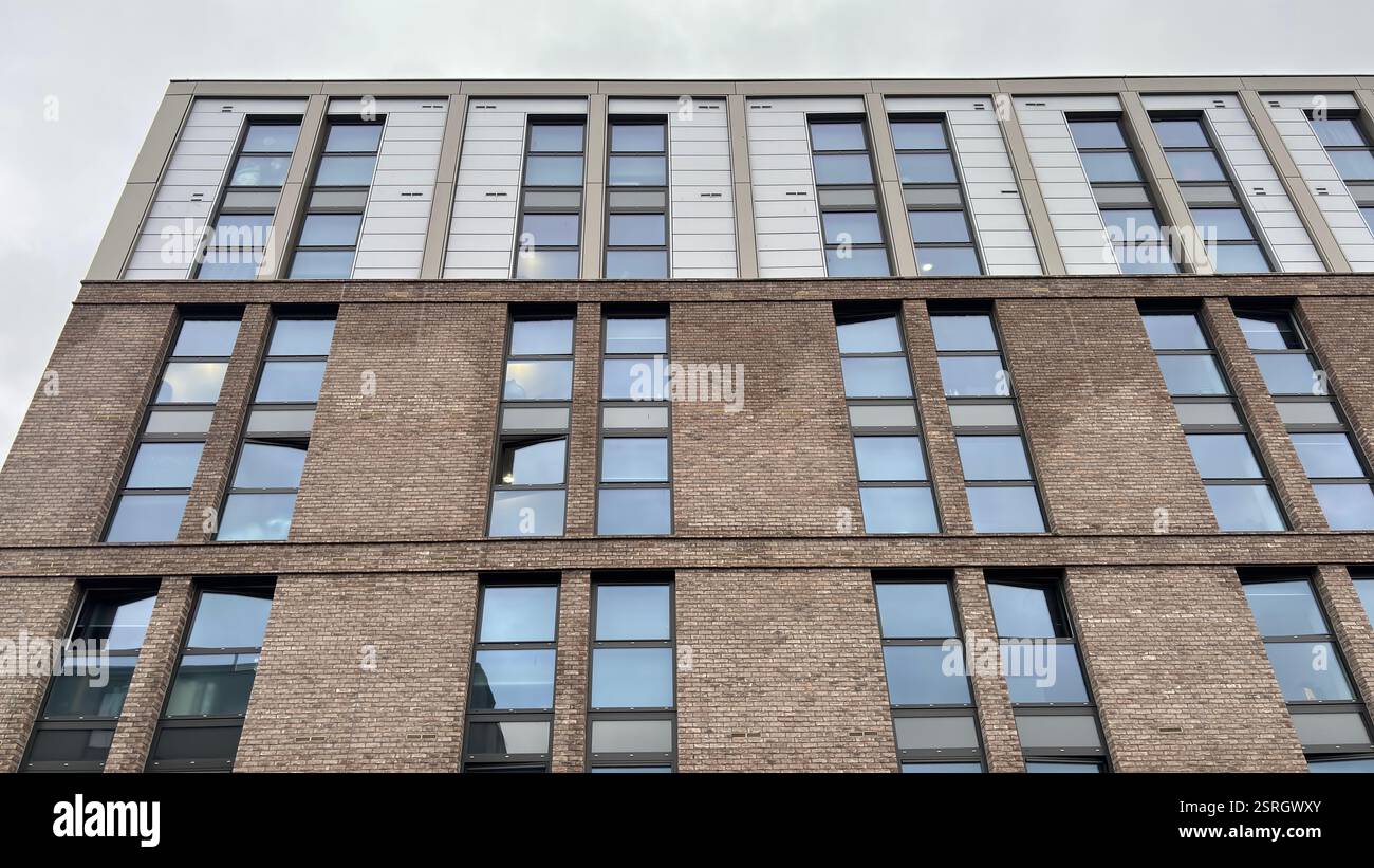 Modern brutal architecture flat living in the middle of the city of Edinburgh. Grungy urban architecture. Modern brutal concrete structure - Smartphone Captured Stock Image