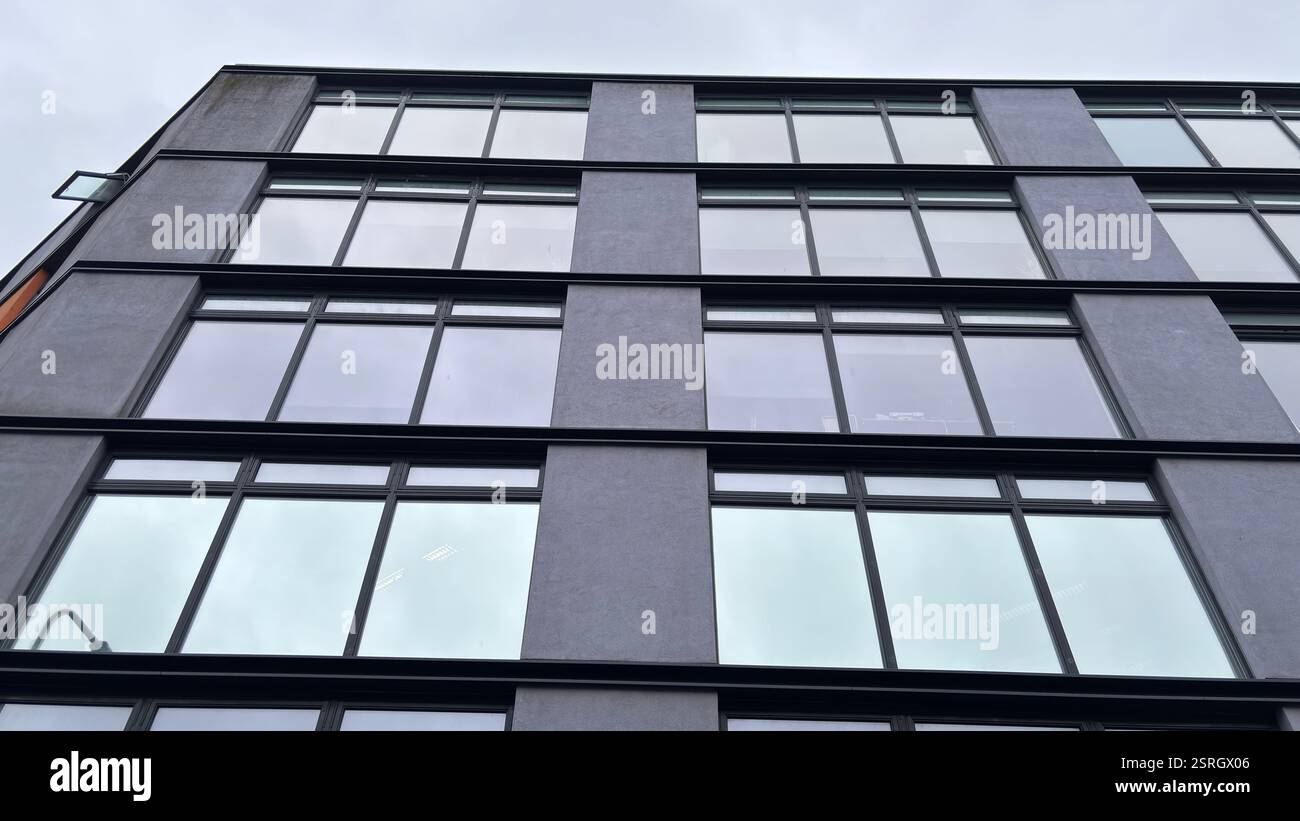 Modern brutal architecture flat living in the middle of the city of Edinburgh. Grungy urban architecture. Modern brutal concrete structure - Smartphone Captured Stock Image