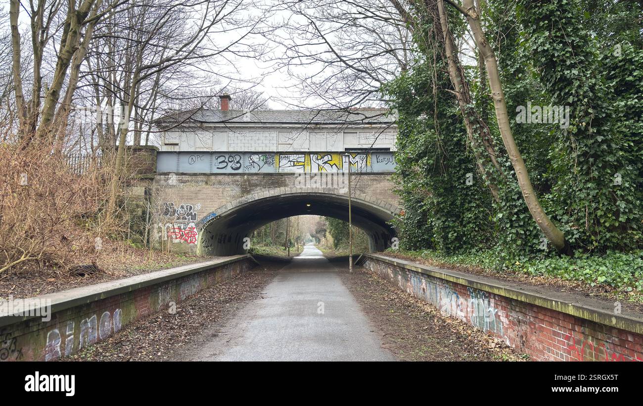 Old Pinkhill railway station cycle path route to city centre of Edinburgh. Old abandoned railway track. Public footpath. - Smartphone Captured Stock Image