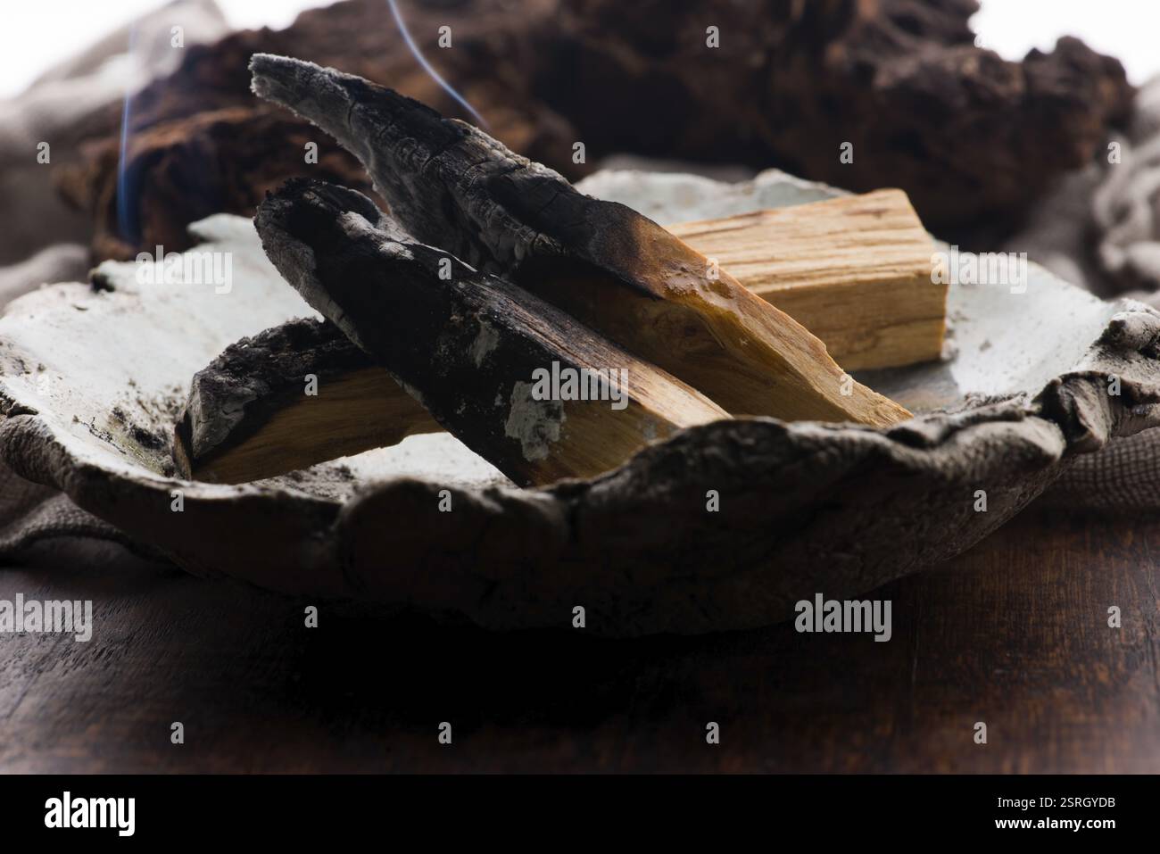 Smudging ceremony using Peruvian Palo Santo holy wood incense stick Stock Photo