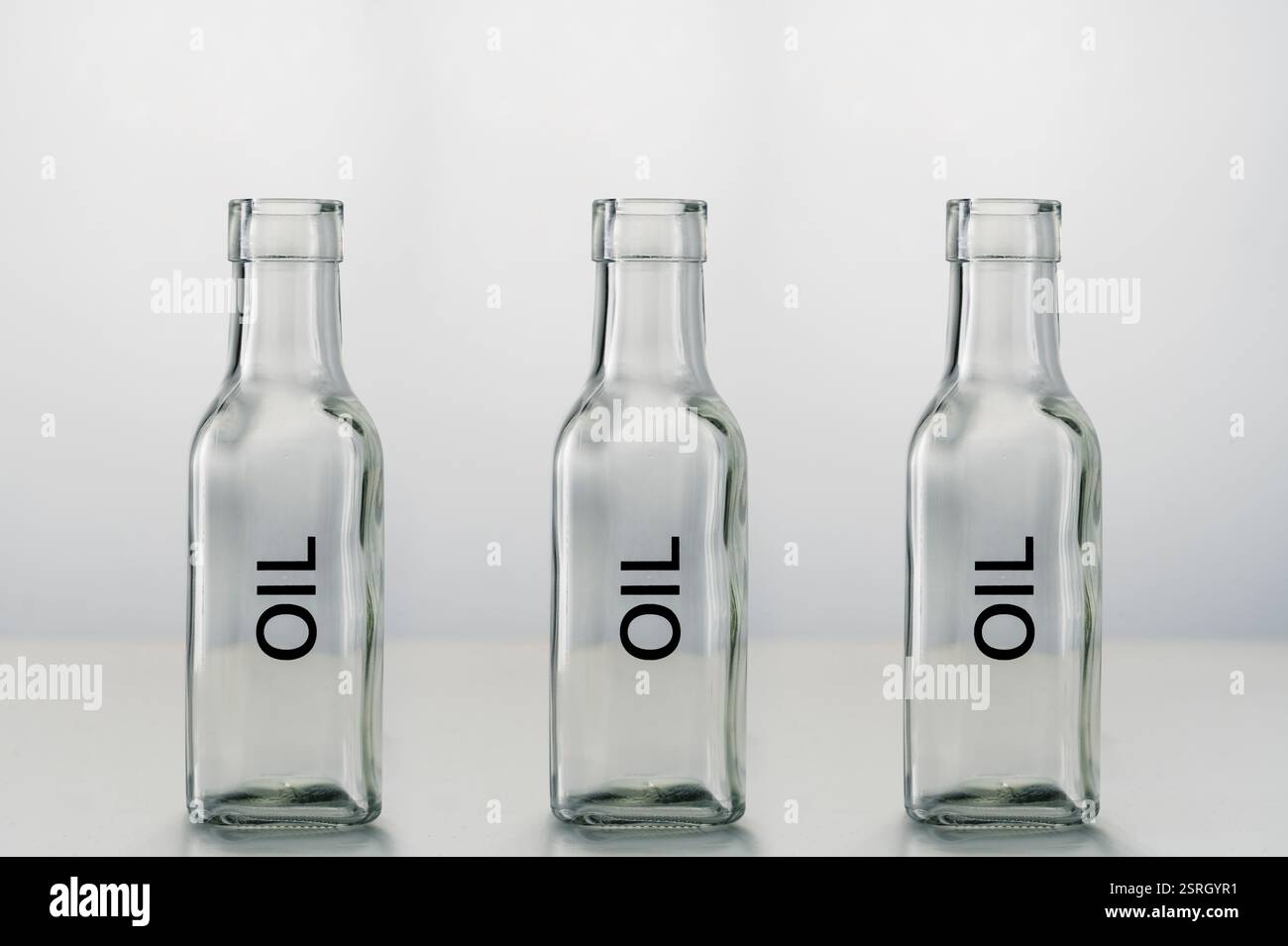 empty glass bottle for oil Stock Photo