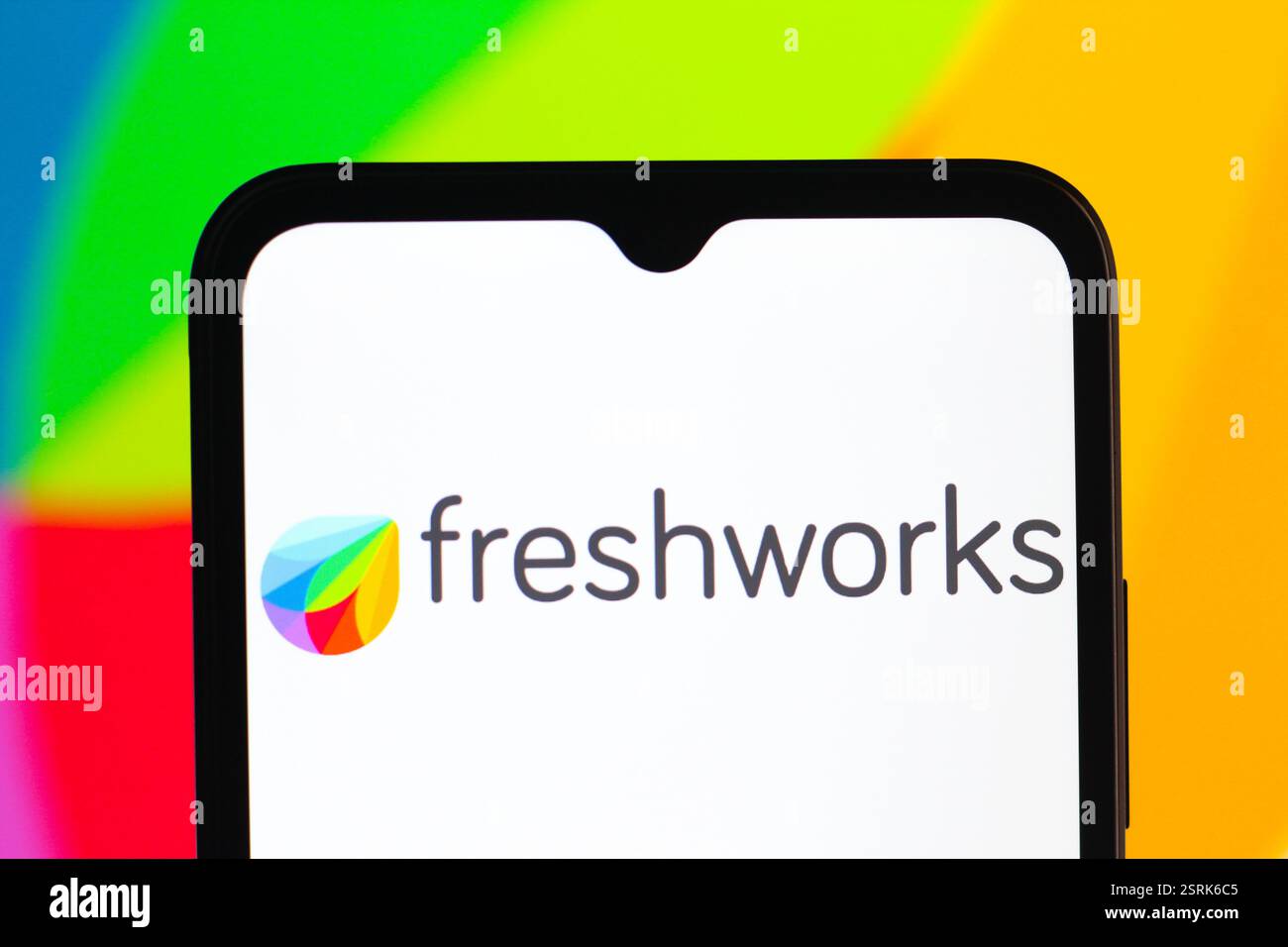 In this photo illustration, the Freshworks, Inc. logo is seen displayed ...