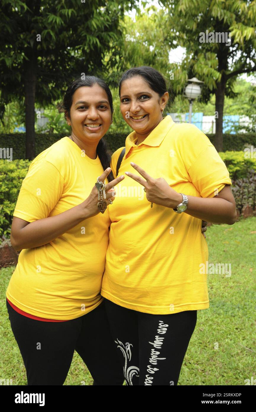 Two women posing photo hi-res stock photography and images - Alamy