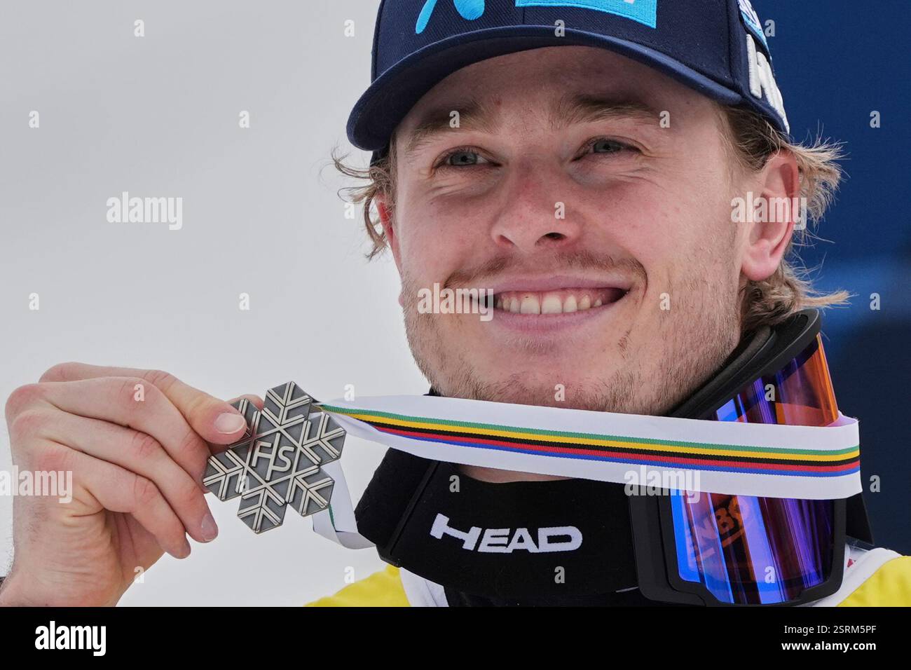 Norway's Atle Lie McGrath shows his silver medal in a men's slalom, at ...