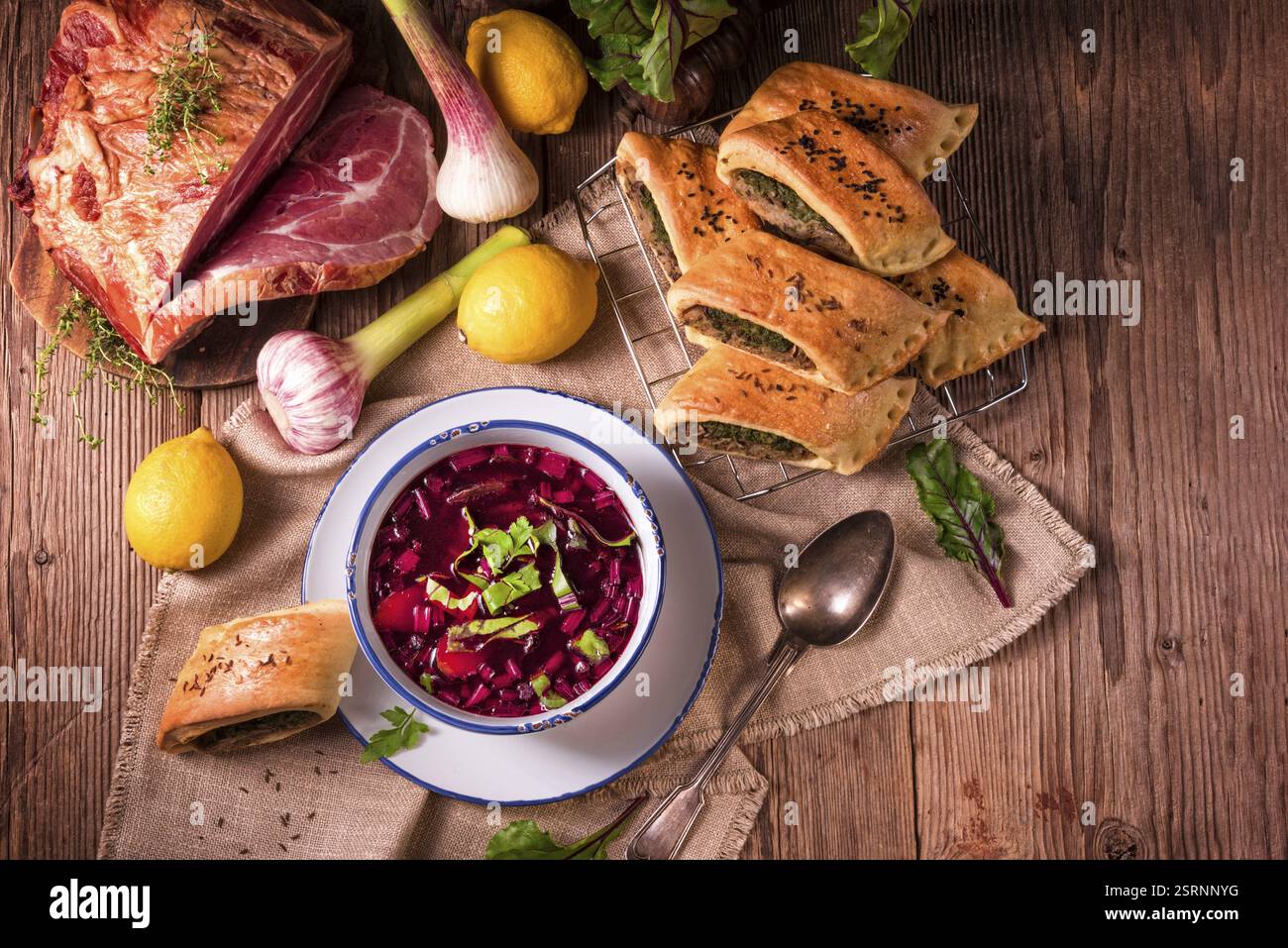 Beet green soup with pastries Stock Photo