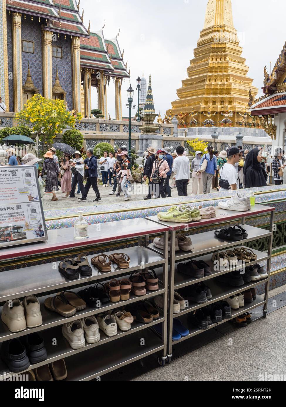 Temple Shoe Racks Bangkok, Thailand - 10 April 2024: A shoe rack stacked with tourists ...