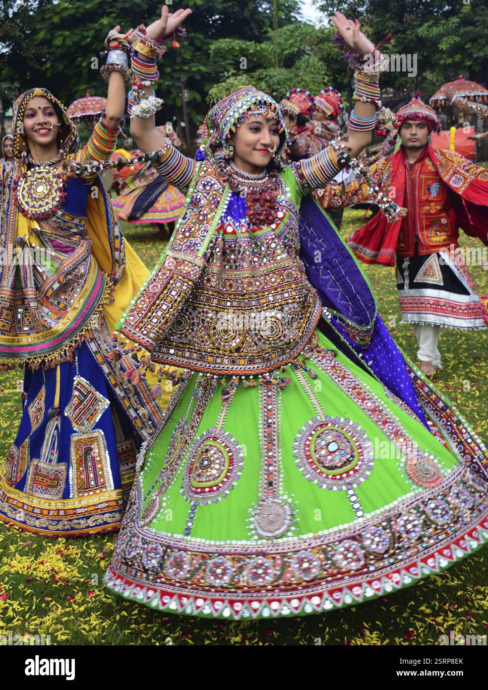 Girls in traditional attire, practice the Garba dance steps in preparation for the Navratri festival in Ahmadabad Stock Photo