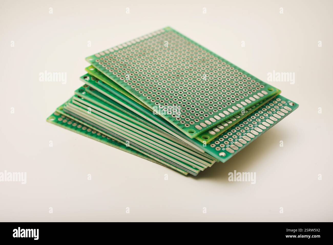 A green breadboard for electronics. The printed circuit board Stock ...