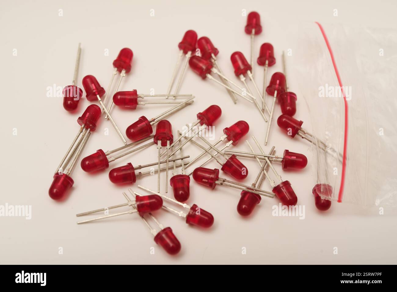 Red LEDs. The electronic component. Old LED elements. Stock Photo