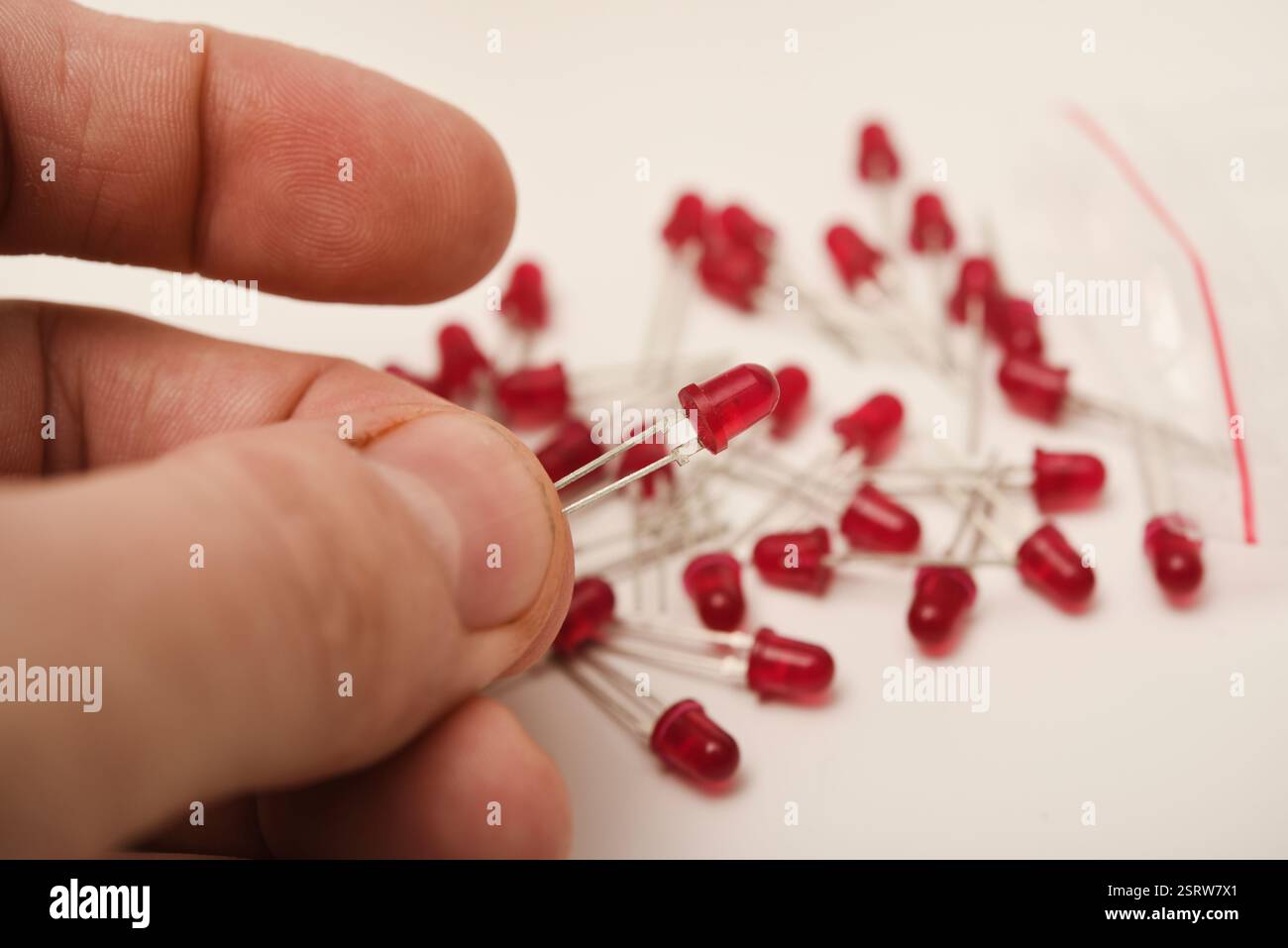 Red LEDs. The electronic component. Old LED elements. Stock Photo