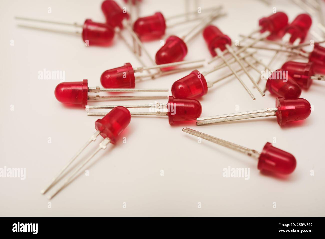Red LEDs. The electronic component. Old LED elements. Stock Photo