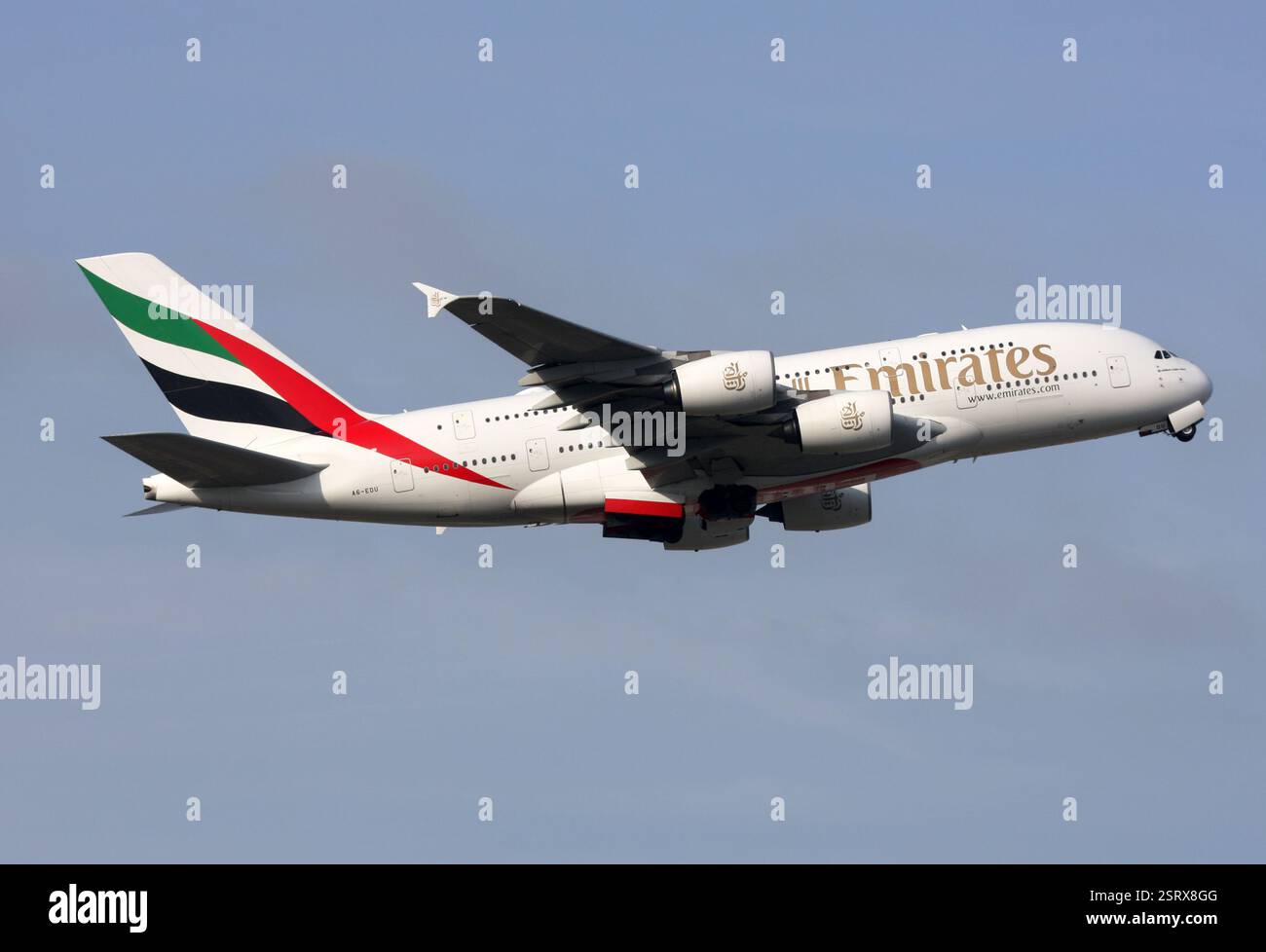 An Airbus A380 of Emirates departs Gatwick Stock Photo