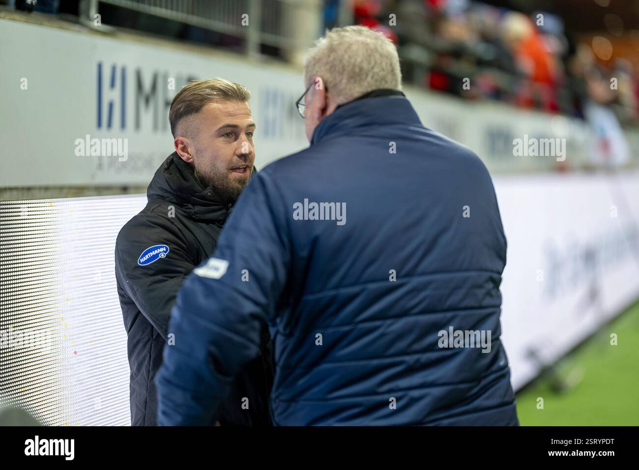 Heidenheim, Deutschland. 16th Feb, 2025. Niklas Dorsch (FC Heidenheim, 39), Holger Sanwald (1