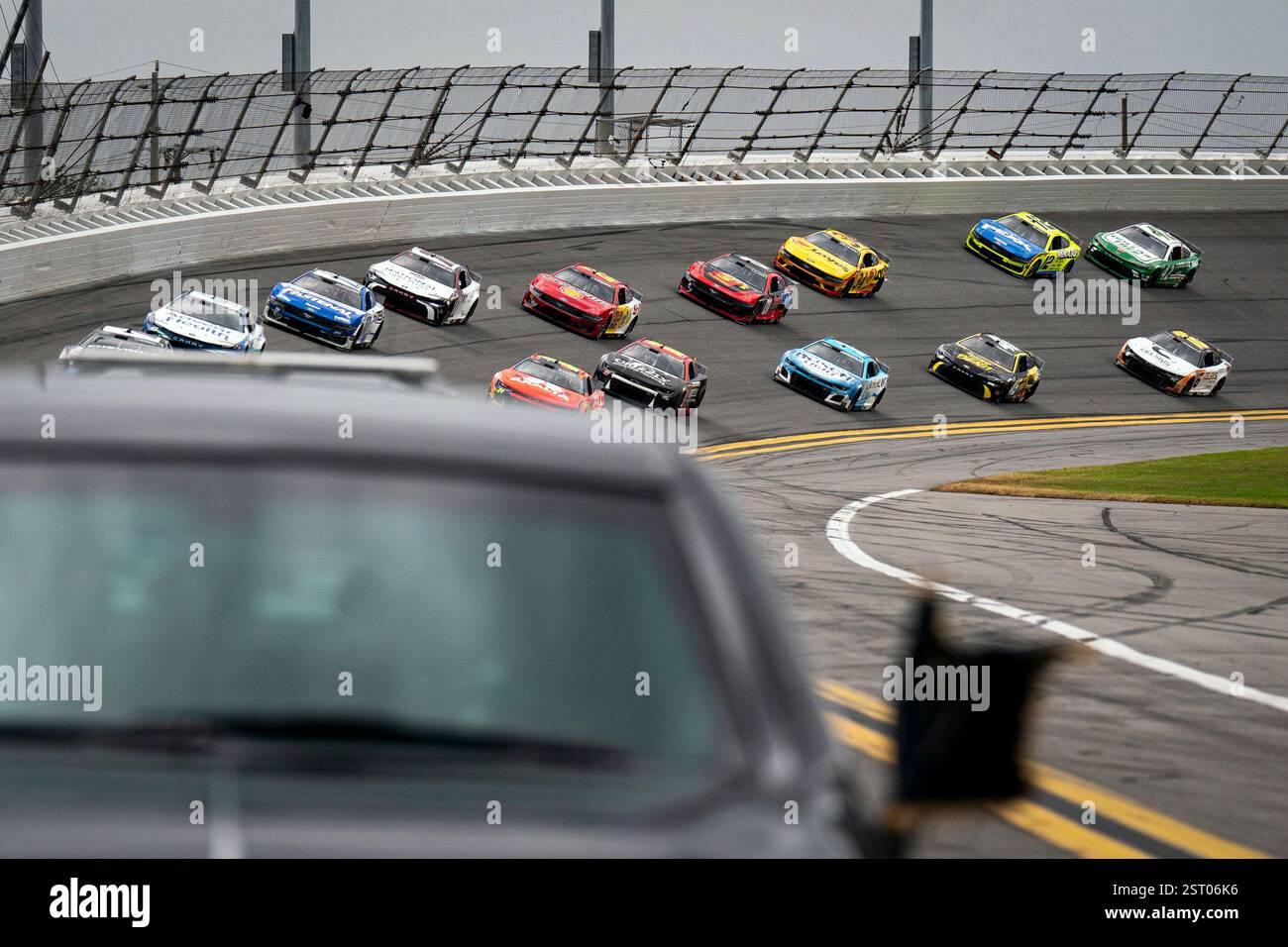 President Donald Trump rides in the presidential limousine known as ...