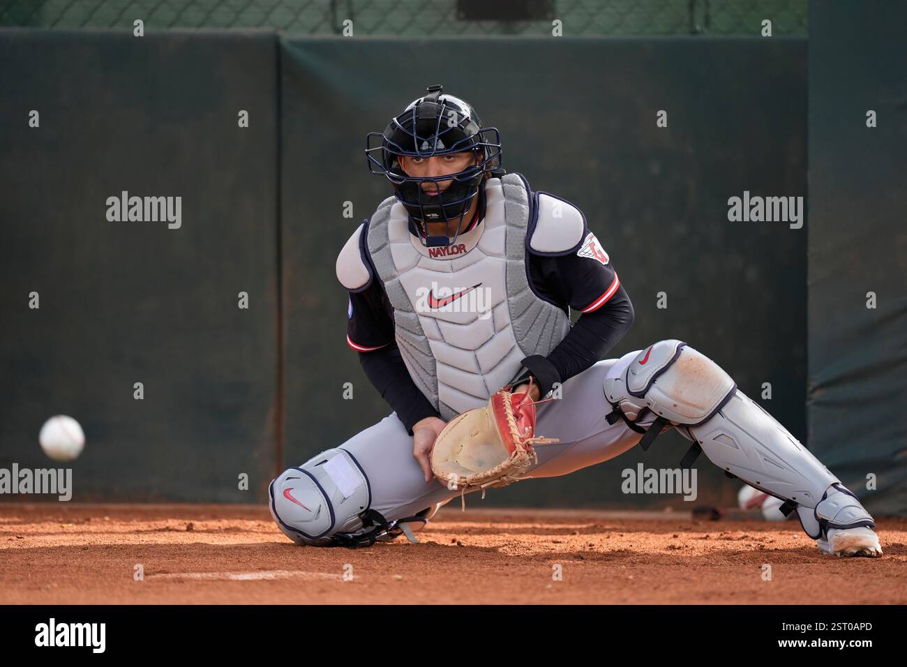 Cleveland Guardians catcher Bo Naylor eyes a ball during spring ...