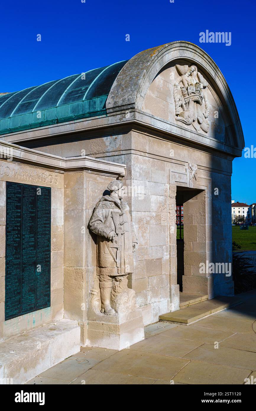 Statue of a Commando holding a machine gun at the Portsmouth Naval Memorial Extension in Southsea, Portsmouth, south coast Hampshire, UK Stock Photo