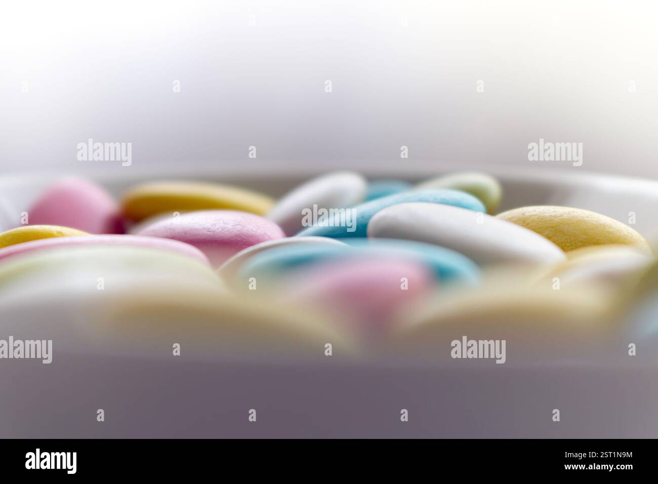 Colorful Easter candies close-up in a light background Stock Photo