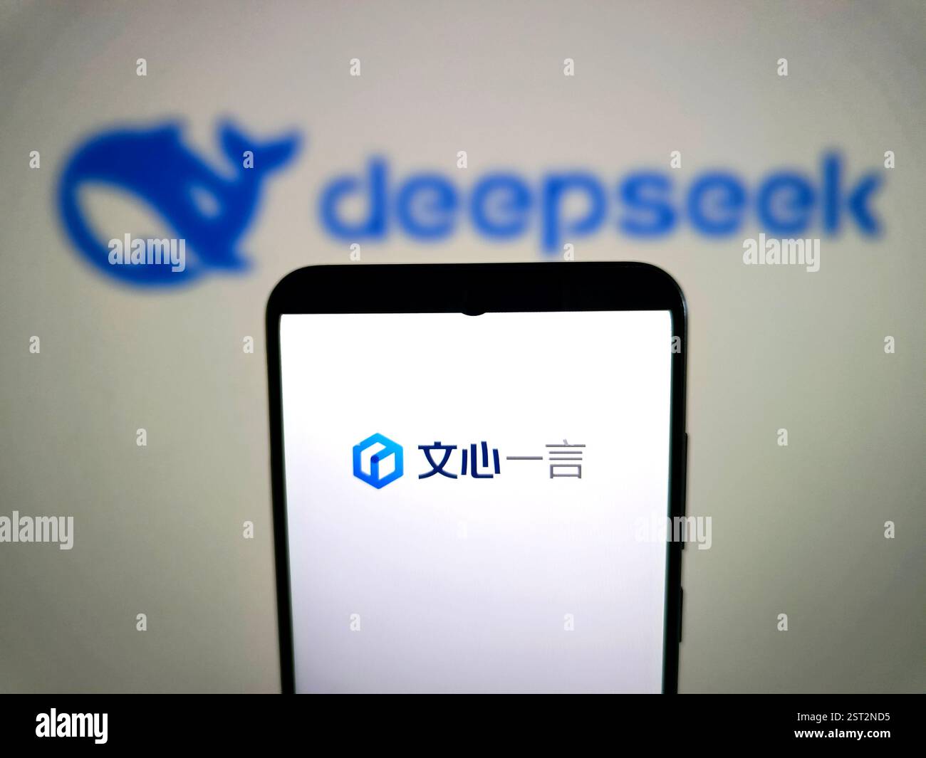 suqian-china-february-17-2025-an-illustration-shows-the-ernie-bot-logo-inside-a-smartphone-with-the-deepseek-logo-in-the-background-in-suqian-2ST2ND5.jpg