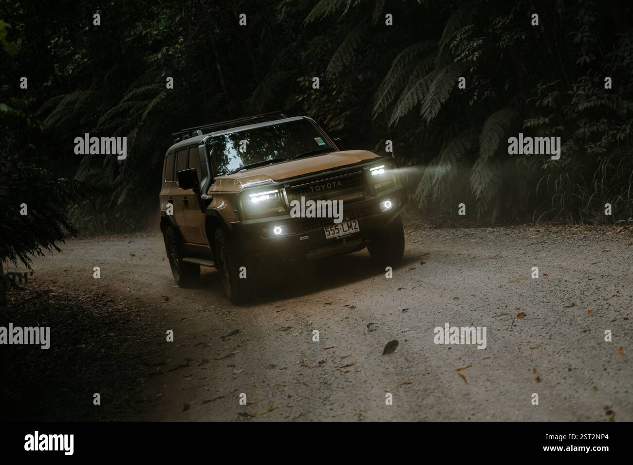 The All-New Toyota LandCruiser Prado driving through the tropical ...